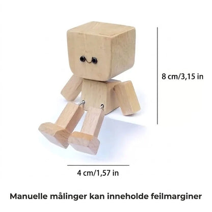 Sjarmerend liten trefigur med gyngefunksjon og 12 magnetiske uttrykk